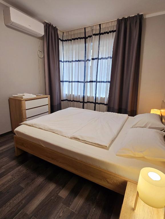 Postel nebo postele na pokoji v ubytování Best Choice Apartment