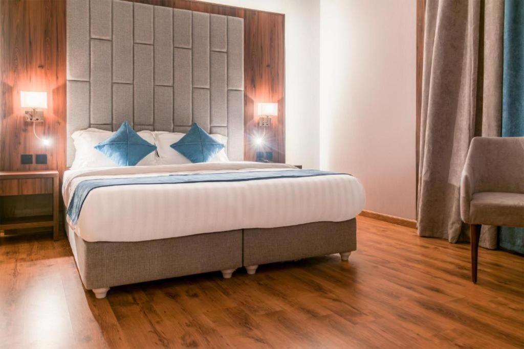 Postel nebo postele na pokoji v ubytování Palette Luxury MAS Hotel