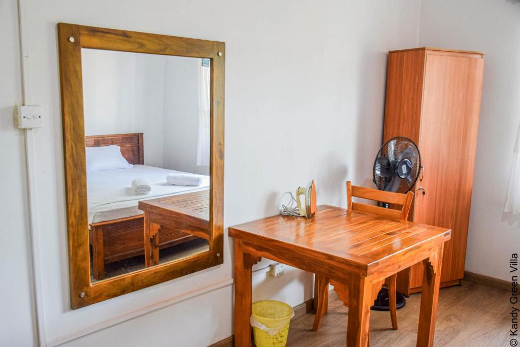 Postel nebo postele na pokoji v ubytování Kandy Green Villa