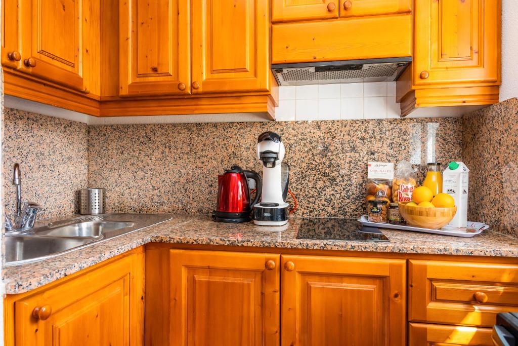 Kuchyň nebo kuchyňský kout v ubytování Apartamento Can Jaume