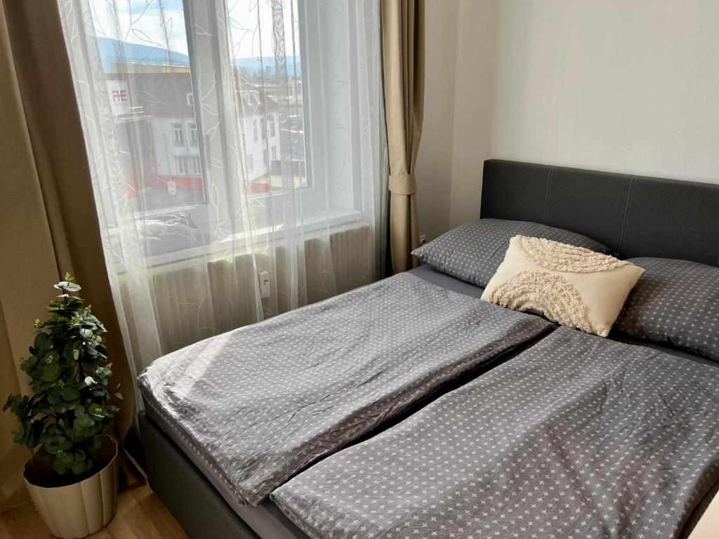 Postel nebo postele na pokoji v ubytování Apartment Near Red Bull Ring