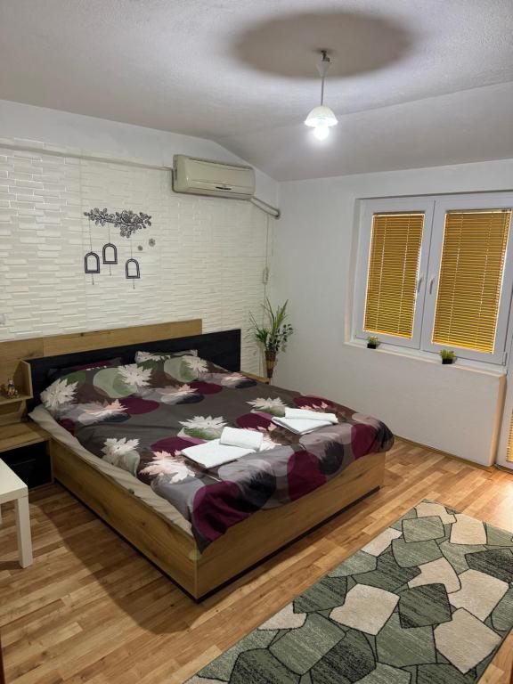 Postel nebo postele na pokoji v ubytování Suzana Rooms