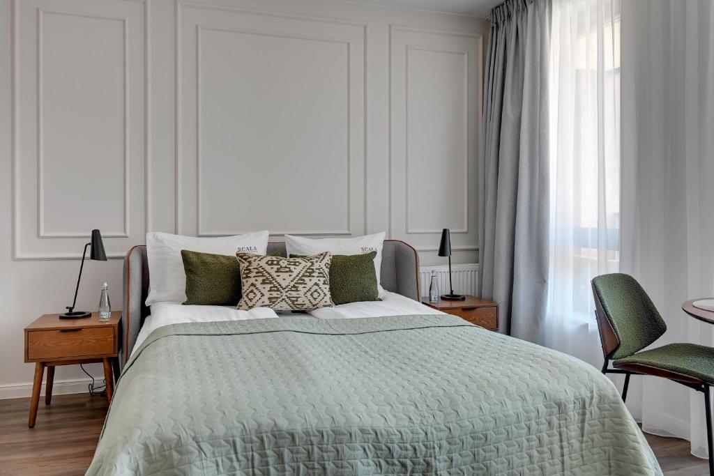 Posteľ alebo postele v izbe v ubytovaní Scala City Center Premium Apartments by Lion Apartments