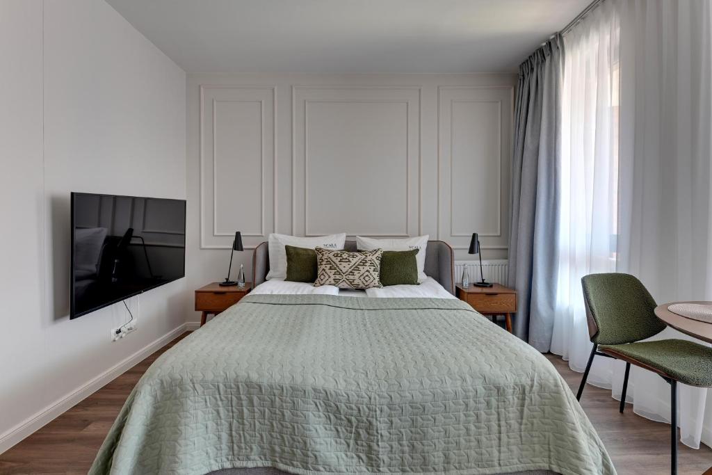 Posteľ alebo postele v izbe v ubytovaní Scala City Center Premium Apartments by Lion Apartments