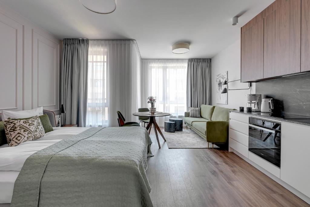 Posteľ alebo postele v izbe v ubytovaní Scala City Center Premium Apartments by Lion Apartments