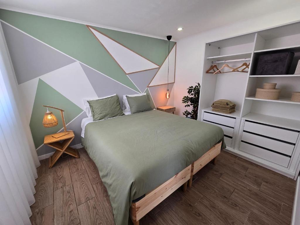 Postel nebo postele na pokoji v ubytování Santa Cruz Villas