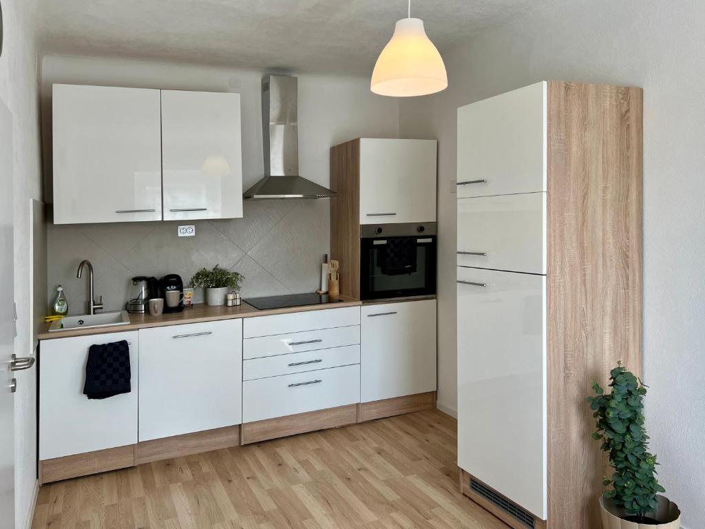 Kuchyň nebo kuchyňský kout v ubytování Apartment Nähe Red Bull Ring