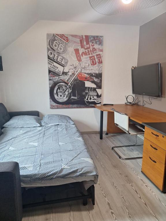 TV a/nebo společenská místnost v ubytování Chez Eric - L'Atypique