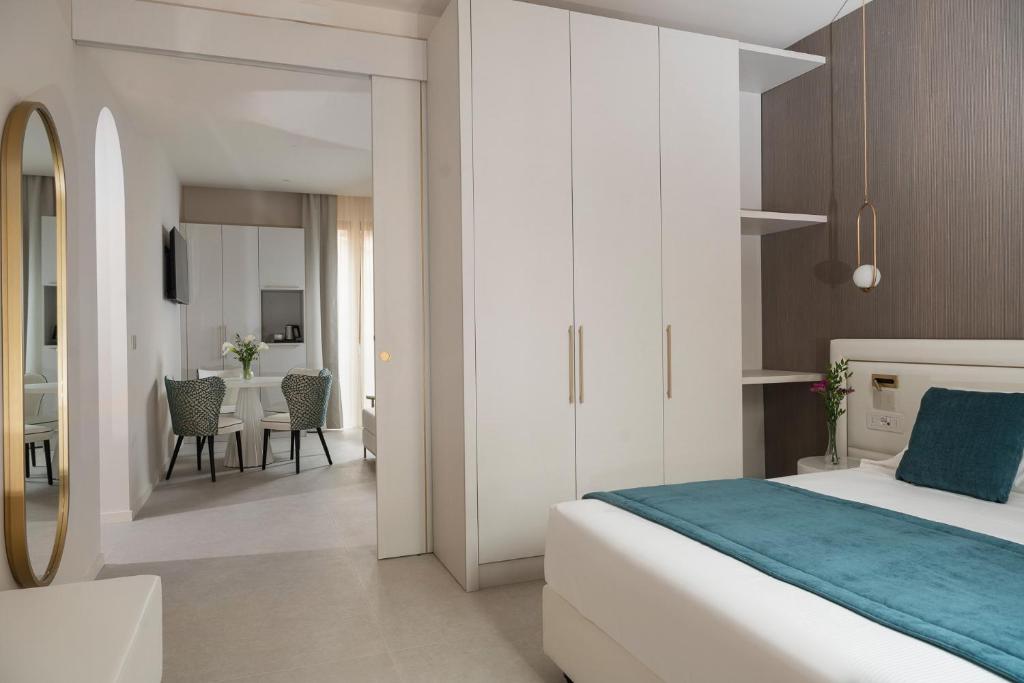 Postel nebo postele na pokoji v ubytování Hotel Parma e Oriente Wellness & Spa