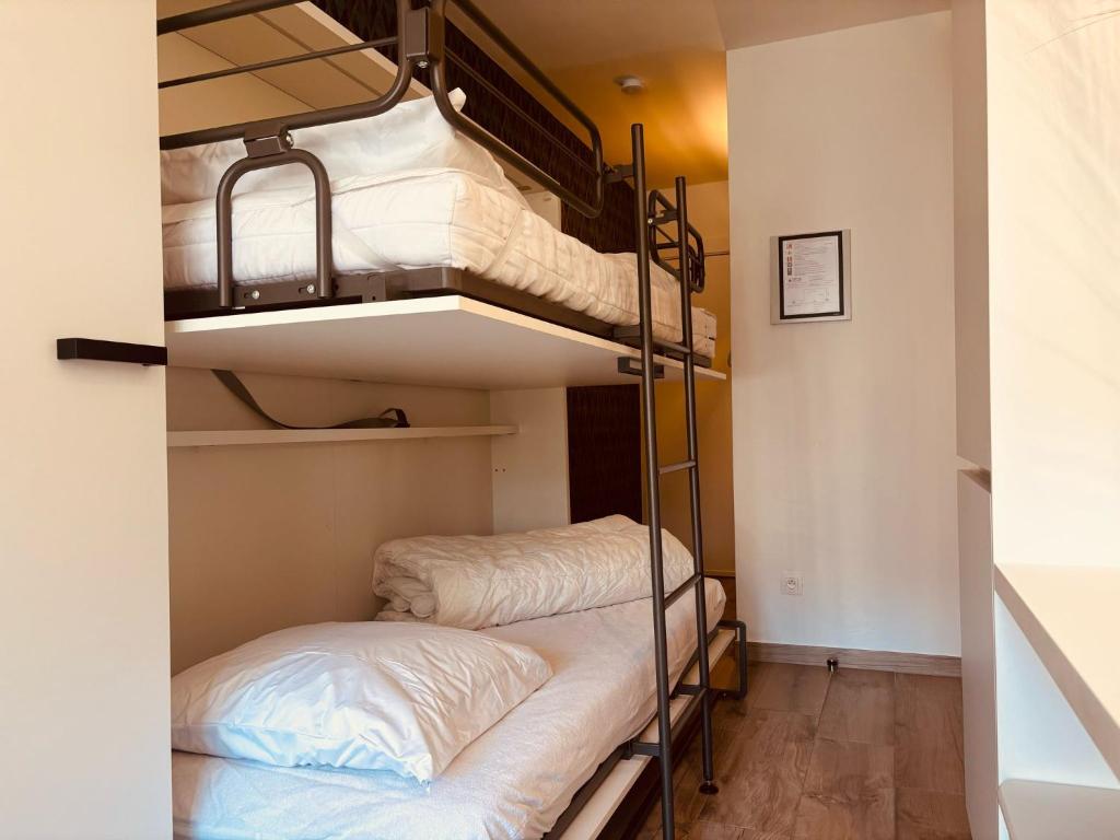 Ένα ή περισσότερα κρεβάτια σε δωμάτιο στο Duynenhuys 0101