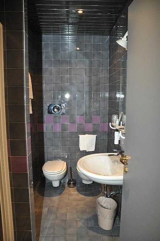 Koupelna v ubytování Hotel Comtur