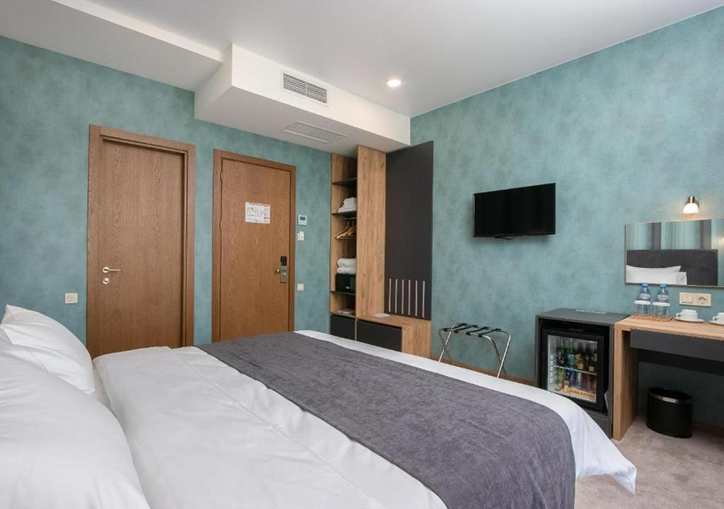 TV a/nebo společenská místnost v ubytování Hotel Flames