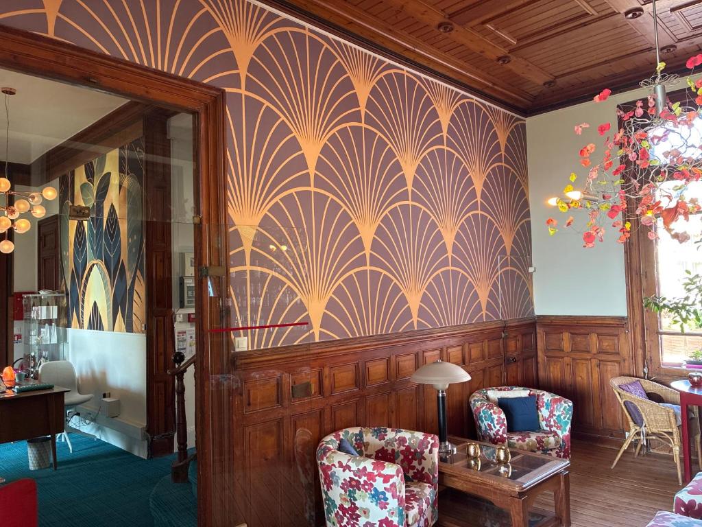 Posezení v ubytování Hôtel Outre-Mer - Villa Le Couchant