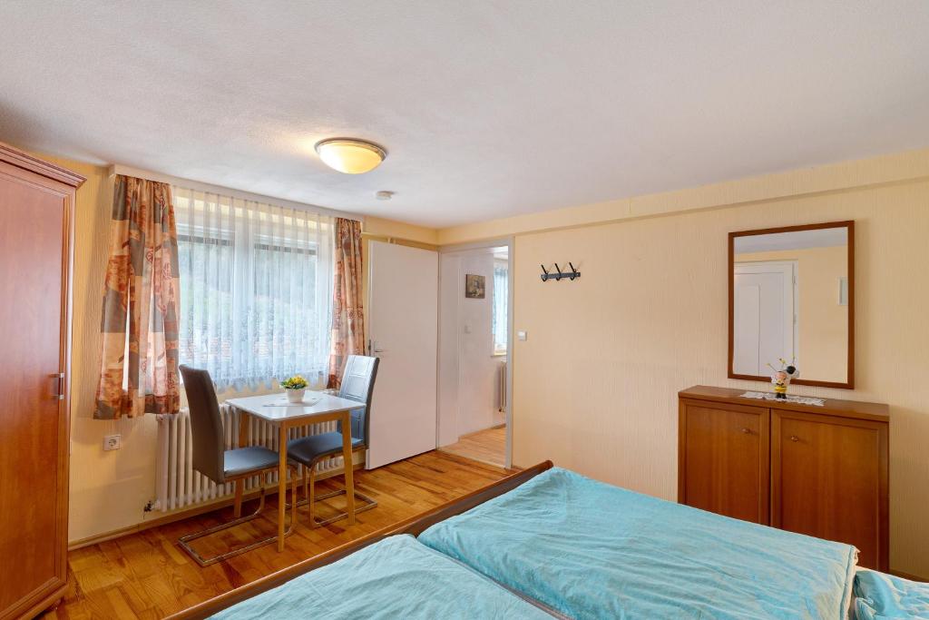 Postel nebo postele na pokoji v ubytování Haus Am Schroffen