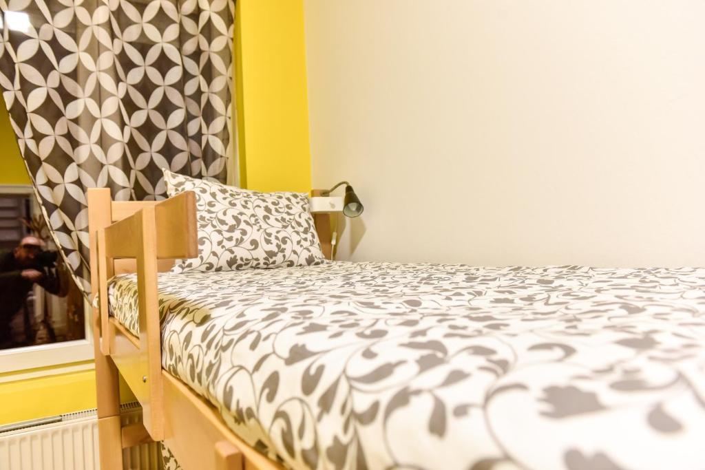 Postel nebo postele na pokoji v ubytování Get Inn Skopje Hostel