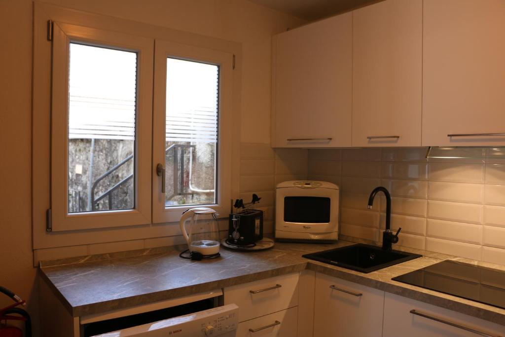 A kitchen or kitchenette at Casa Melina 1