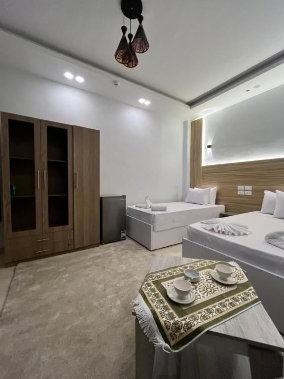 Llit o llits en una habitació de Triple garden view hotel