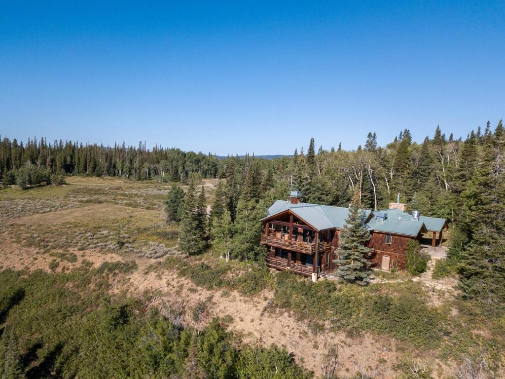 an aerial view of a large house in the woods at Arapaho Lodge in Kremmling