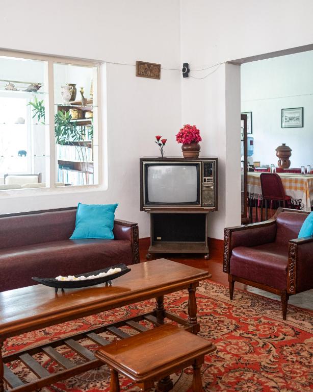 TV a/nebo společenská místnost v ubytování Fortuna Heritage Home