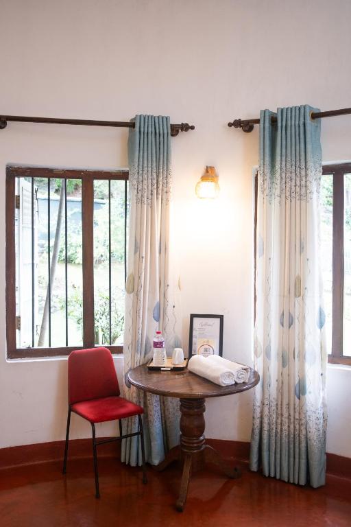 Postel nebo postele na pokoji v ubytování Fortuna Heritage Home