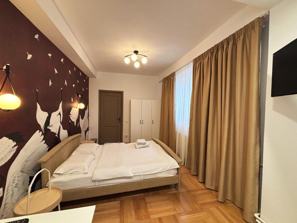 Postel nebo postele na pokoji v ubytování Vila A&B