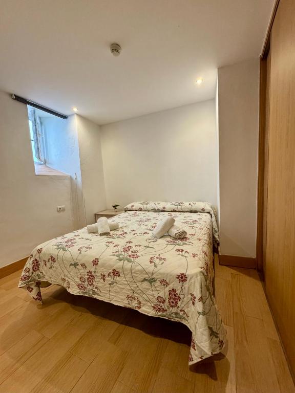 Postel nebo postele na pokoji v ubytování Alcazar Suites