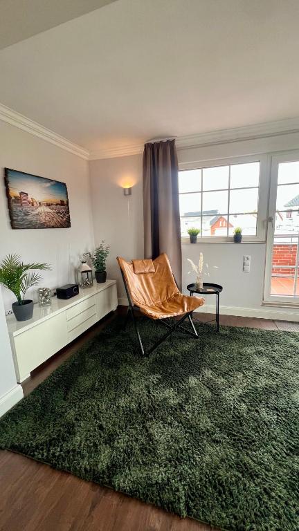 Posezení v ubytování Ferienwohnung Nr. 9