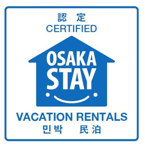 Central Osakaに飾ってある許可証、賞状、看板またはその他の書類