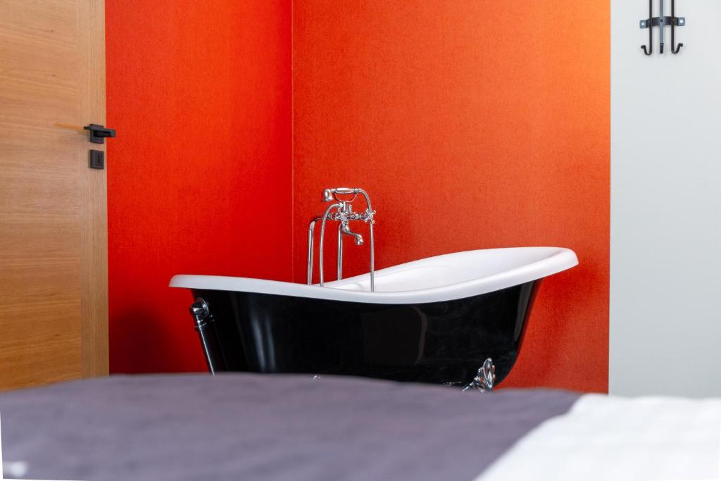 Koupelna v ubytování Vetus Hotel