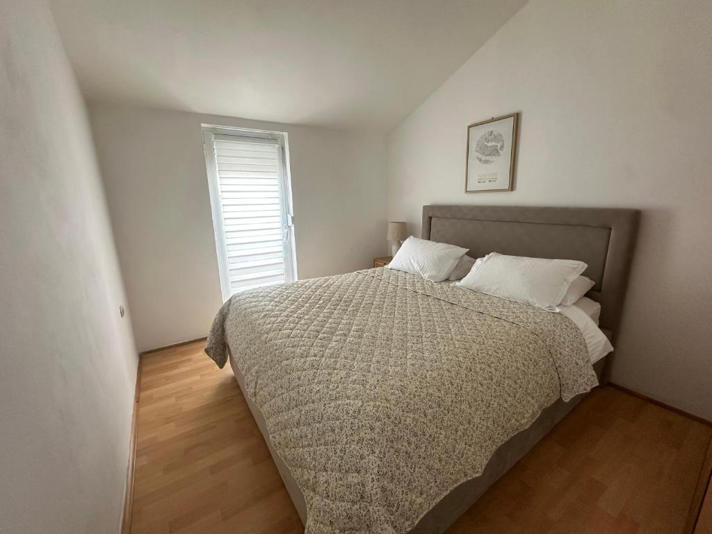 Posteľ alebo postele v izbe v ubytovaní Apartments Charming