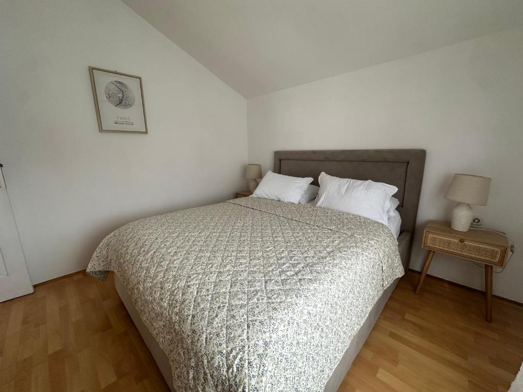 Posteľ alebo postele v izbe v ubytovaní Apartments Charming