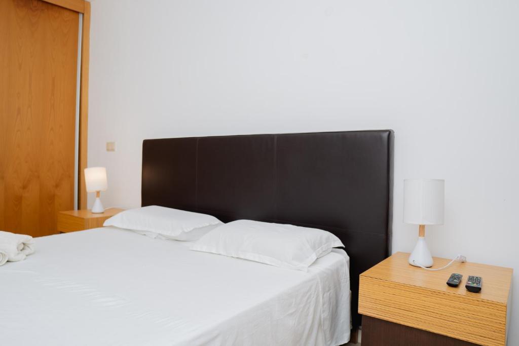 Postel nebo postele na pokoji v ubytování Kriol Guest House