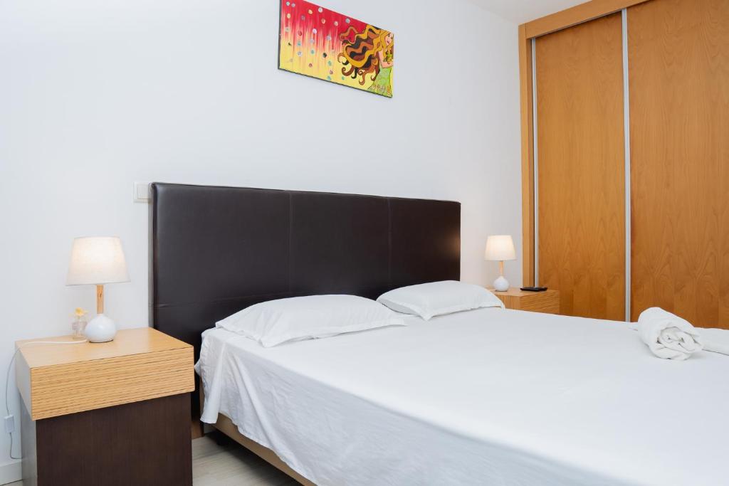 Postel nebo postele na pokoji v ubytování Kriol Guest House