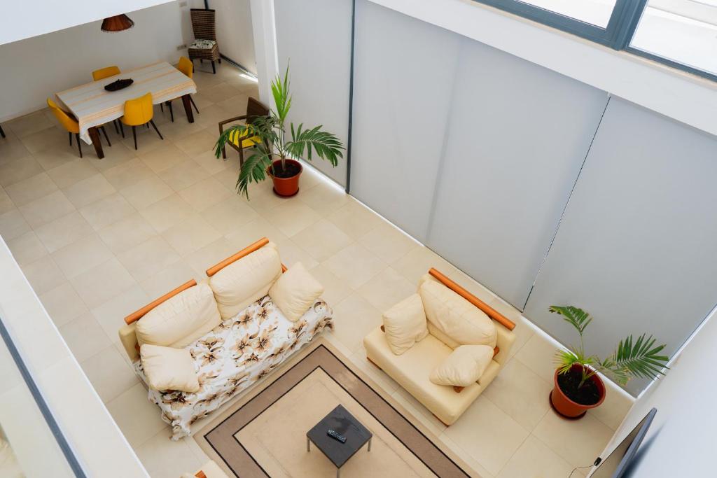 Posezení v ubytování Kriol Guest House