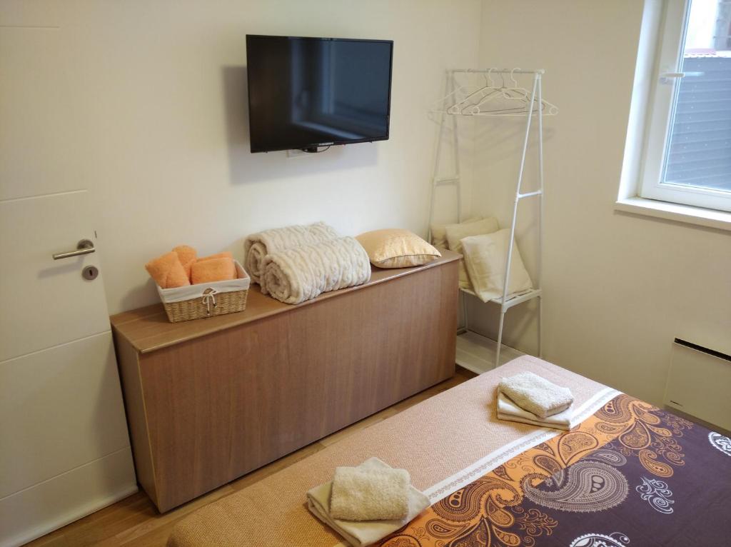Voodi või voodid majutusasutuse CVETIĆ apartman toas