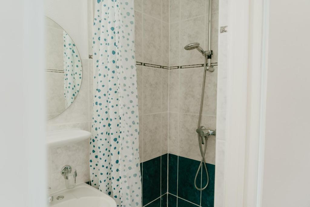 Koupelna v ubytování Hotel Cavalier