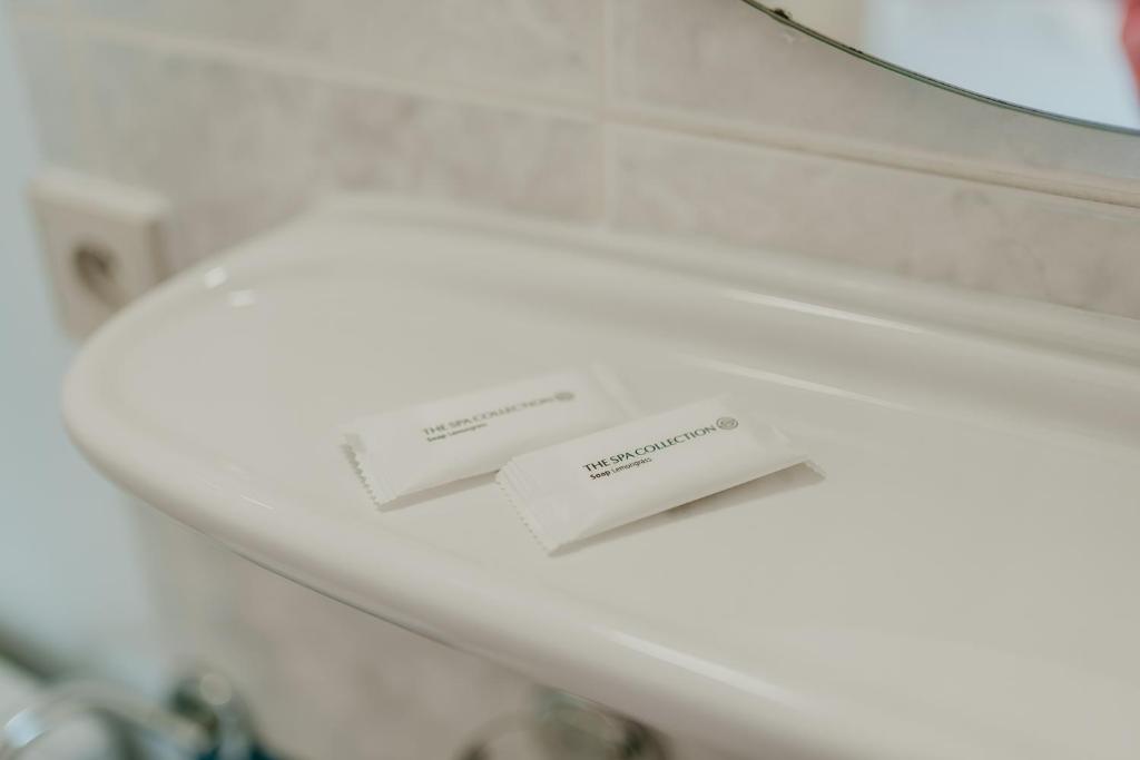 Koupelna v ubytování Hotel Cavalier