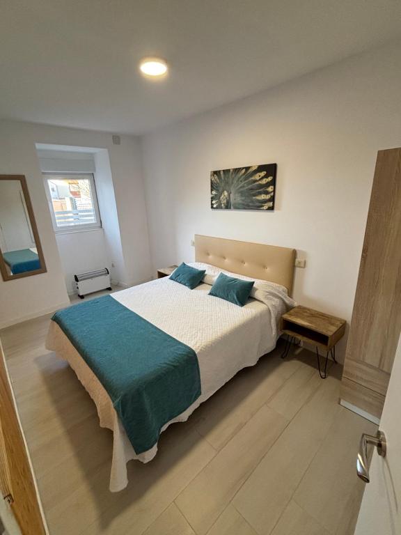 Postel nebo postele na pokoji v ubytování Apartamento Playa Vigo