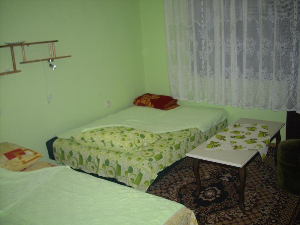 Postel nebo postele na pokoji v ubytování Guest House Nada
