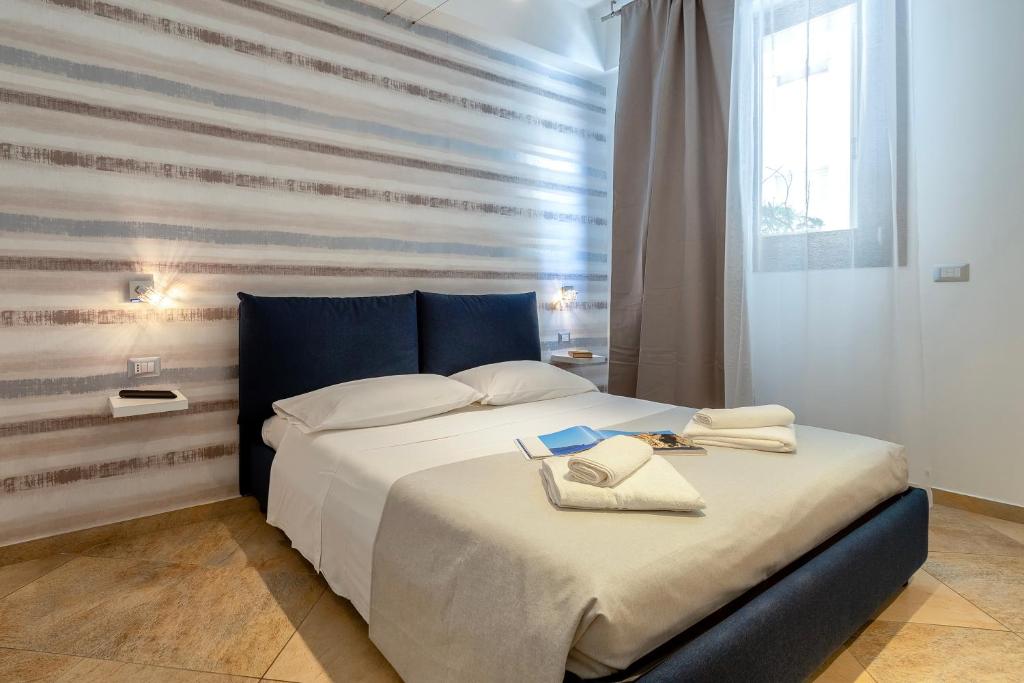 Postel nebo postele na pokoji v ubytování Terre Bianche