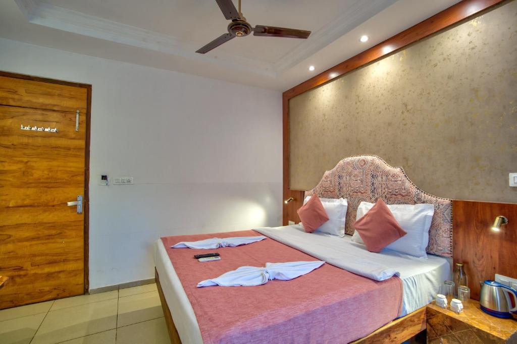 Postel nebo postele na pokoji v ubytování Hotel Sea Sapphire ,Calangute