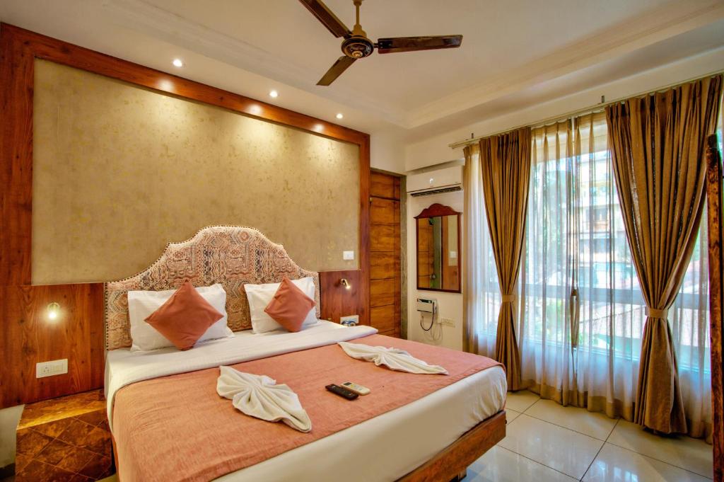 Postel nebo postele na pokoji v ubytování Hotel Sea Sapphire ,Calangute