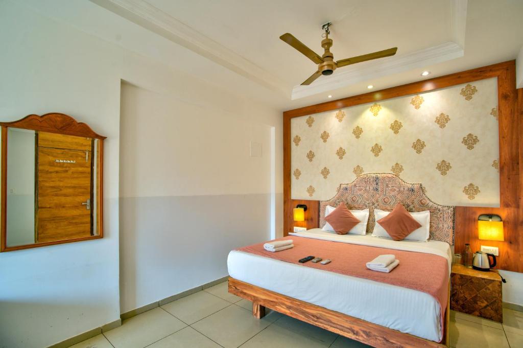 Postel nebo postele na pokoji v ubytování Hotel Sea Sapphire ,Calangute
