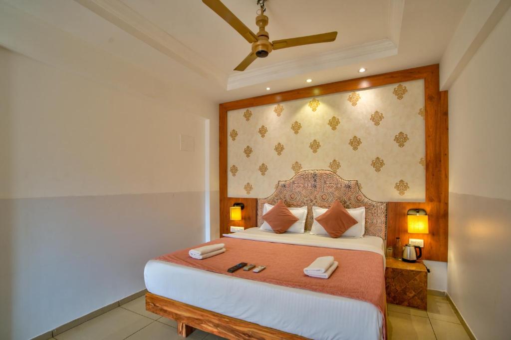Postel nebo postele na pokoji v ubytování Hotel Sea Sapphire ,Calangute