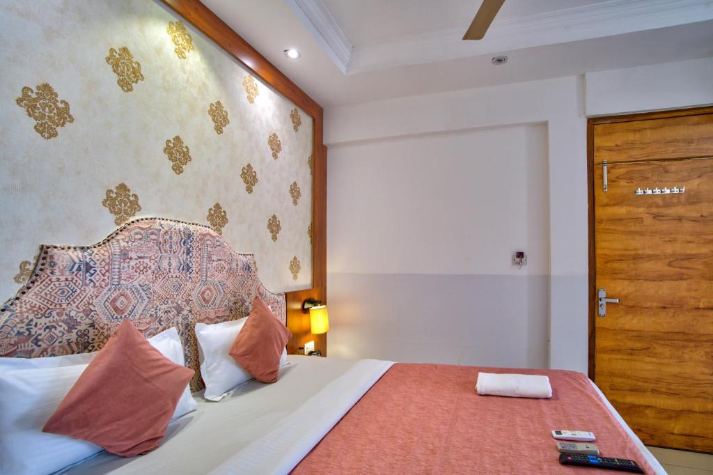 Postel nebo postele na pokoji v ubytování Hotel Sea Sapphire ,Calangute