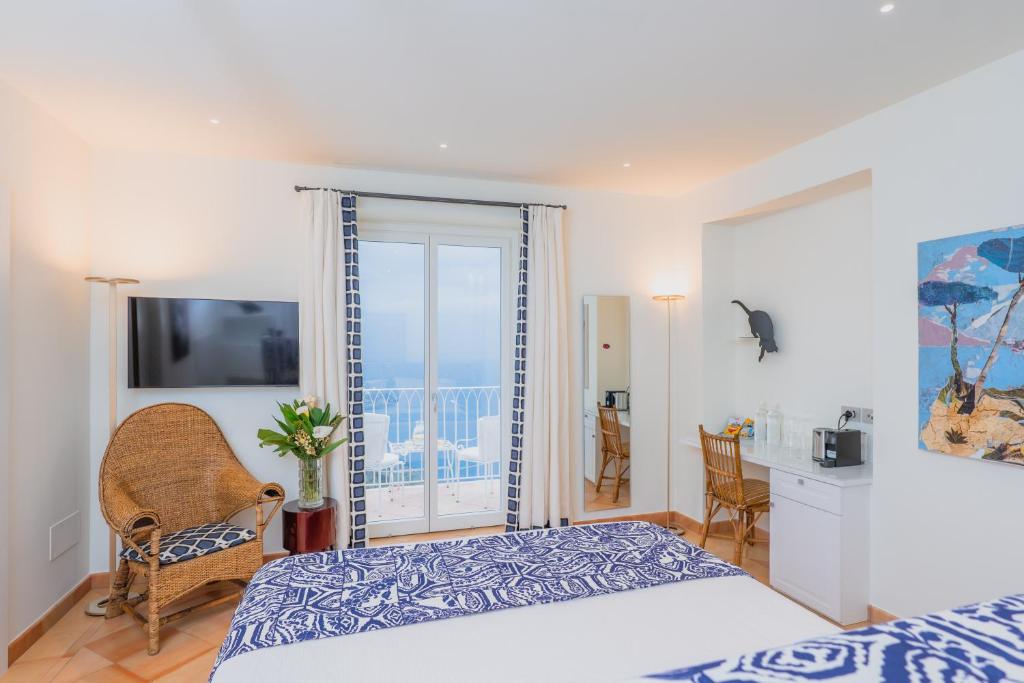 Postel nebo postele na pokoji v ubytování Five Positano
