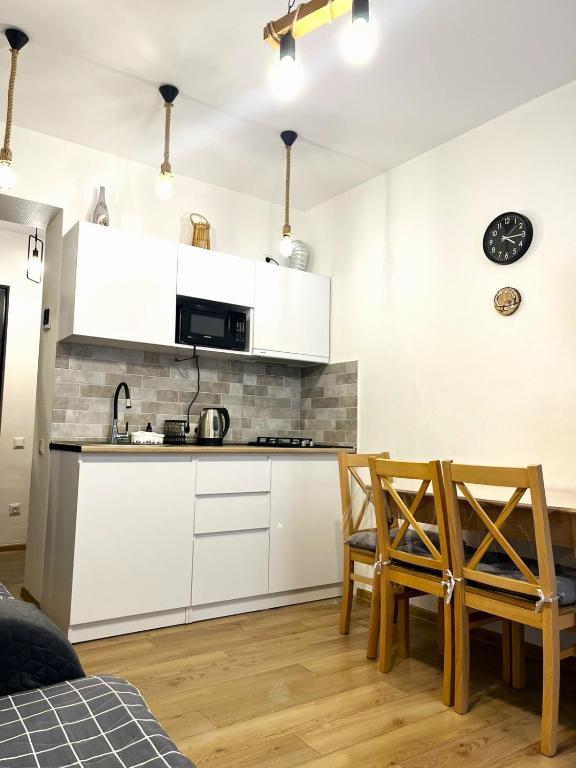Kuchyň nebo kuchyňský kout v ubytování Navelu Didveli Residence