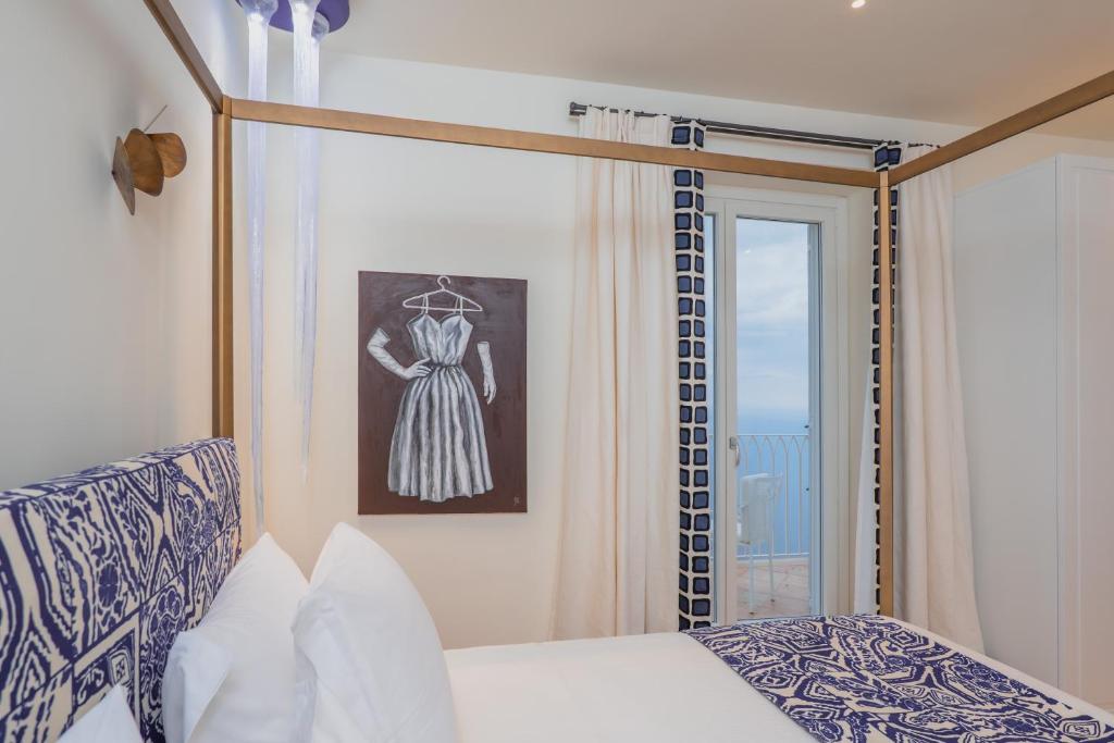 Postel nebo postele na pokoji v ubytování Five Positano