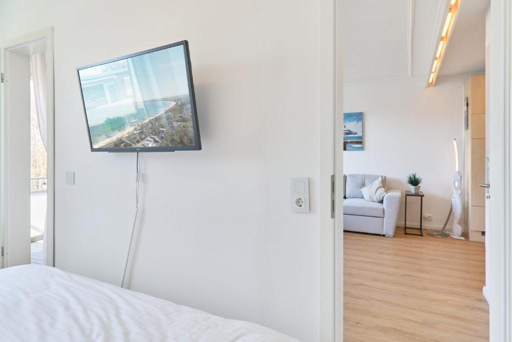Postel nebo postele na pokoji v ubytování Höppnerweg 5 Seemöwe 18