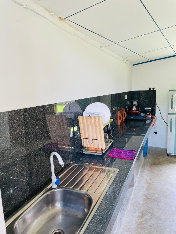 Kuchyň nebo kuchyňský kout v ubytování Villa Hideout